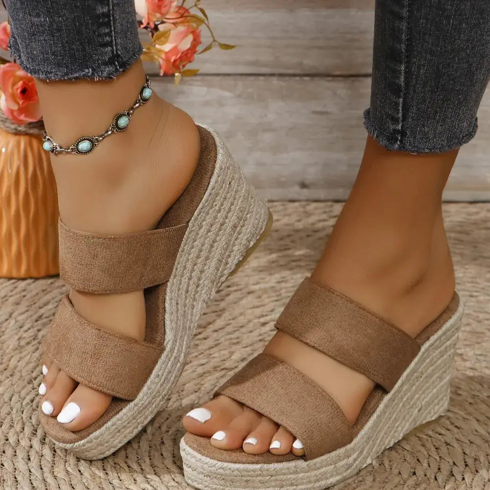 Open Toe Platform Wedge Sandals showcasing a chic design with brown straps and woven wedge heel in a summer setting.